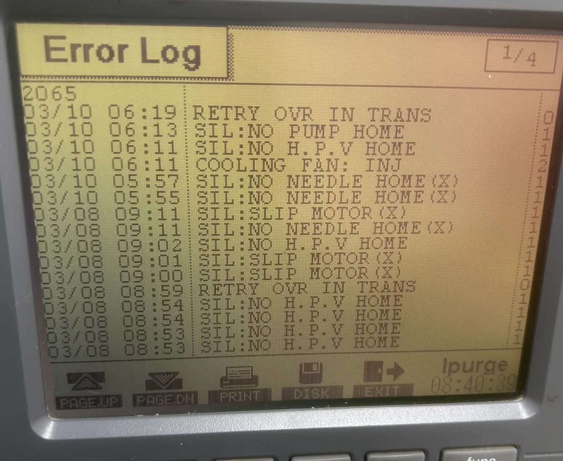 LC-2010CHT error log listing repeated SIL SLIP MOTOR X, SIL NO NEEDLE HOME X and SIL NO H.P.V HOME errors.